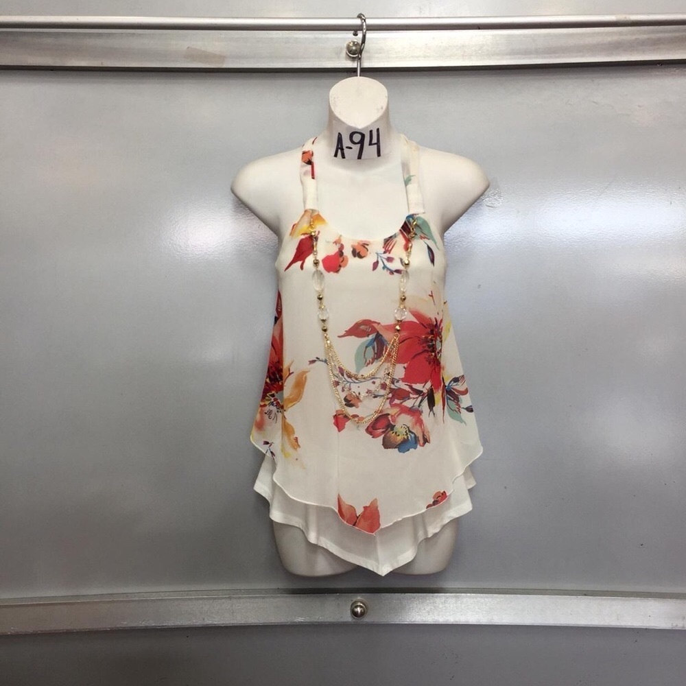 White blouse with colorful flowers